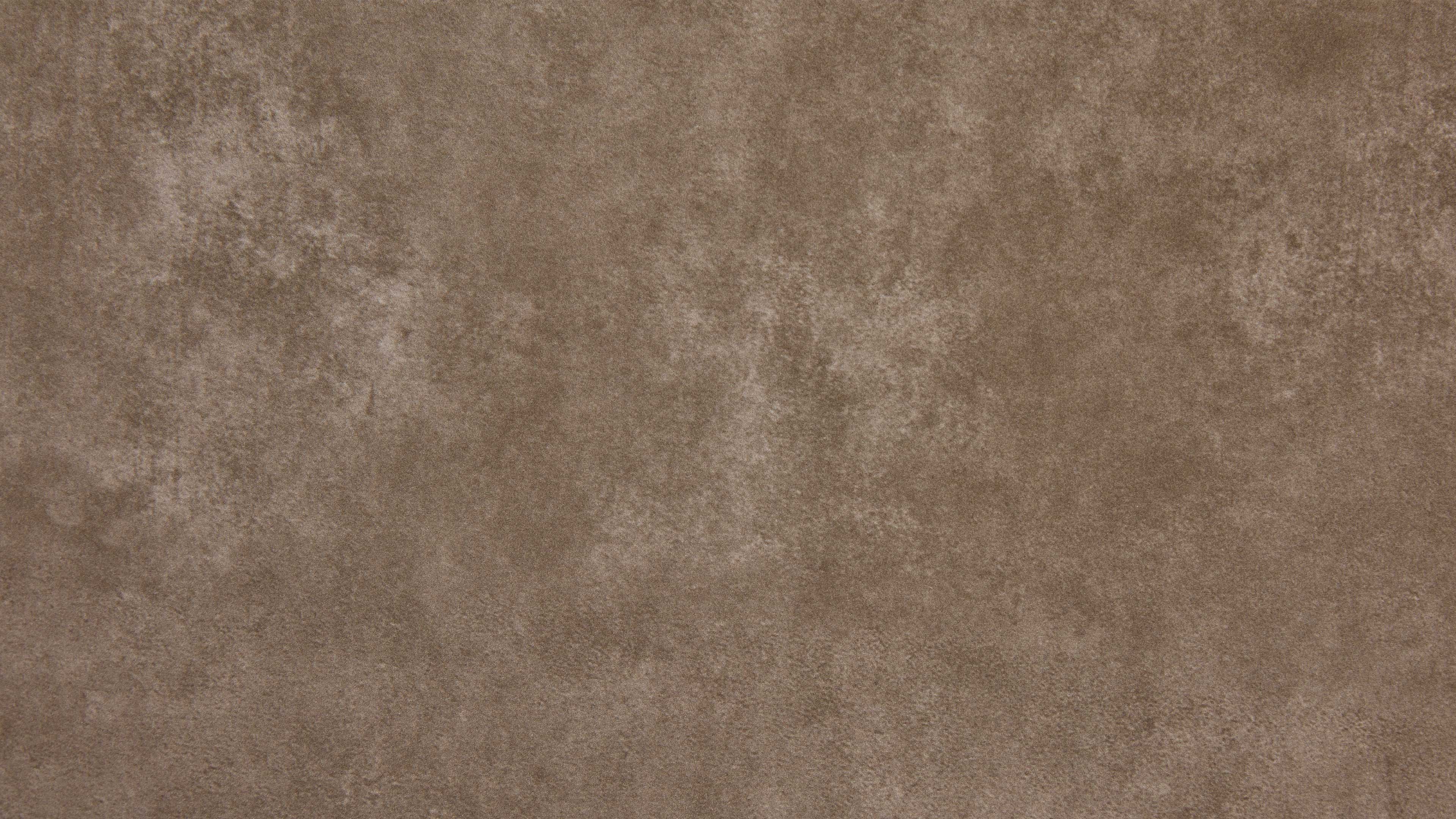 Braunes, samtartig wirkendes Textil mit unregelmäßiger, leicht marmorierter Oberfläche und feinem Flor.