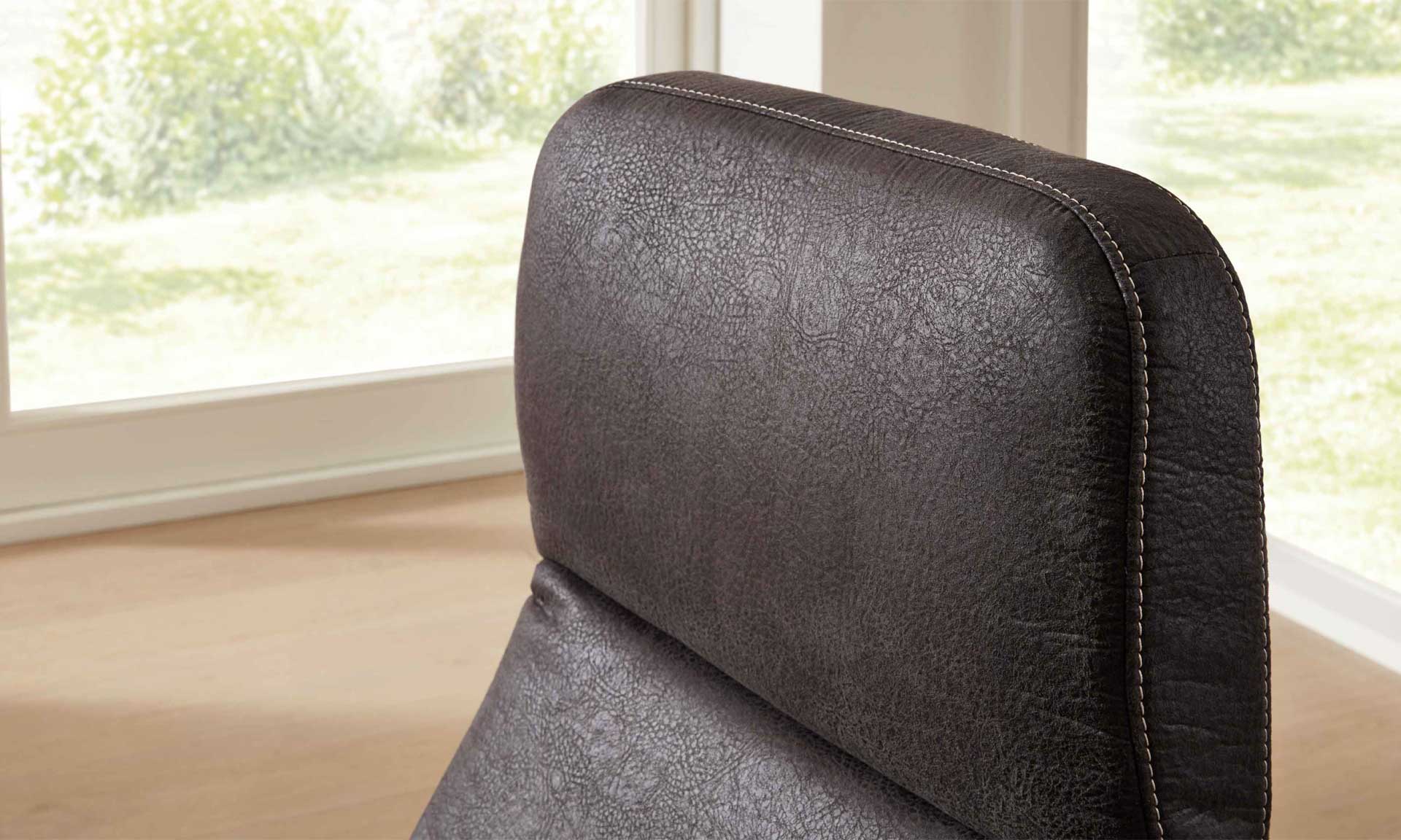 Relaxsessel mit Stoffbezug in anthrazitfarbener Lederoptik und Sternfuß