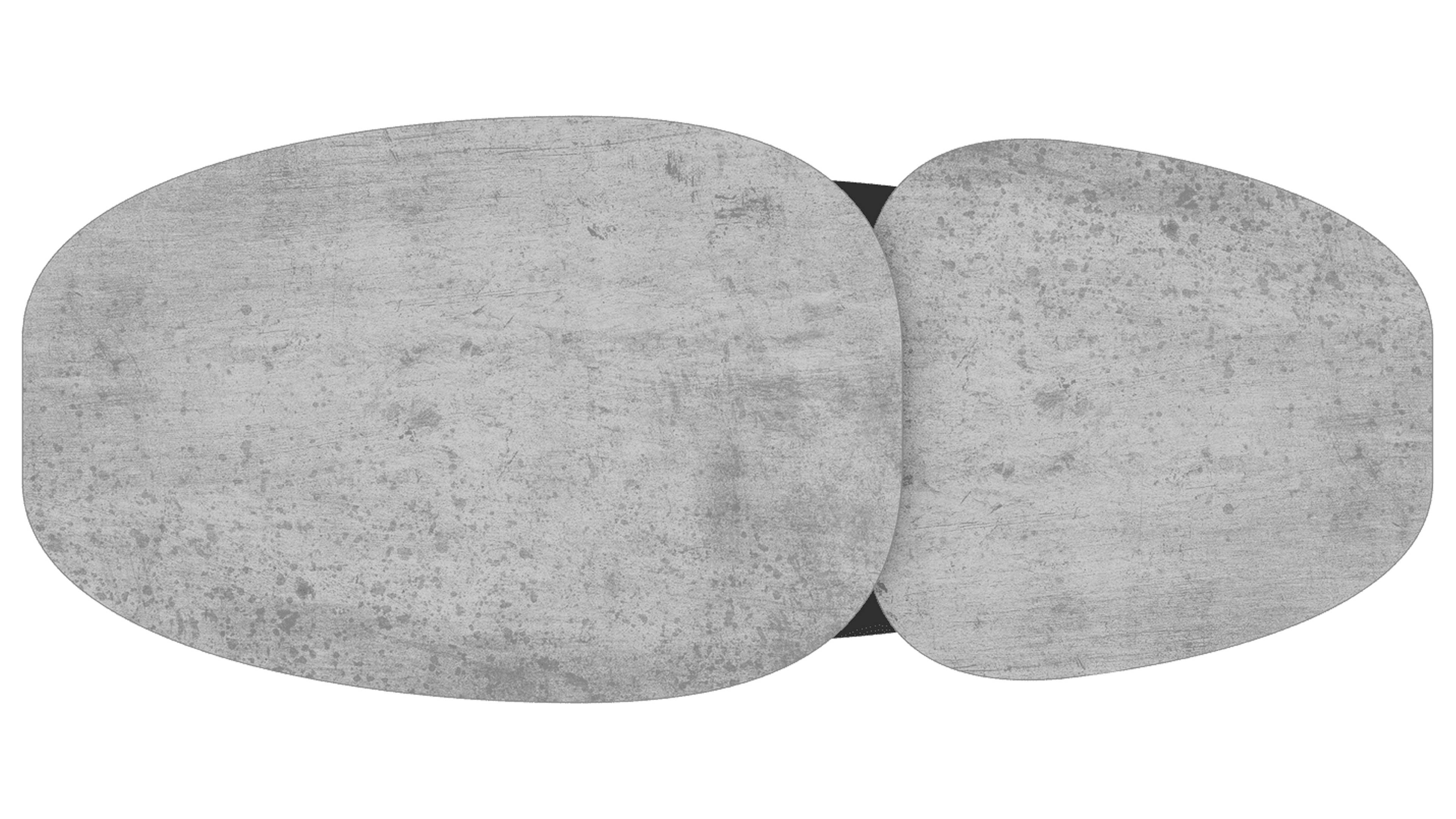 Zwei überlappende, abgerundete Tischplatten in grauer Betonoptik, links größer, rechts kleiner und ein schmaler dunkler Spalt dazwischen.