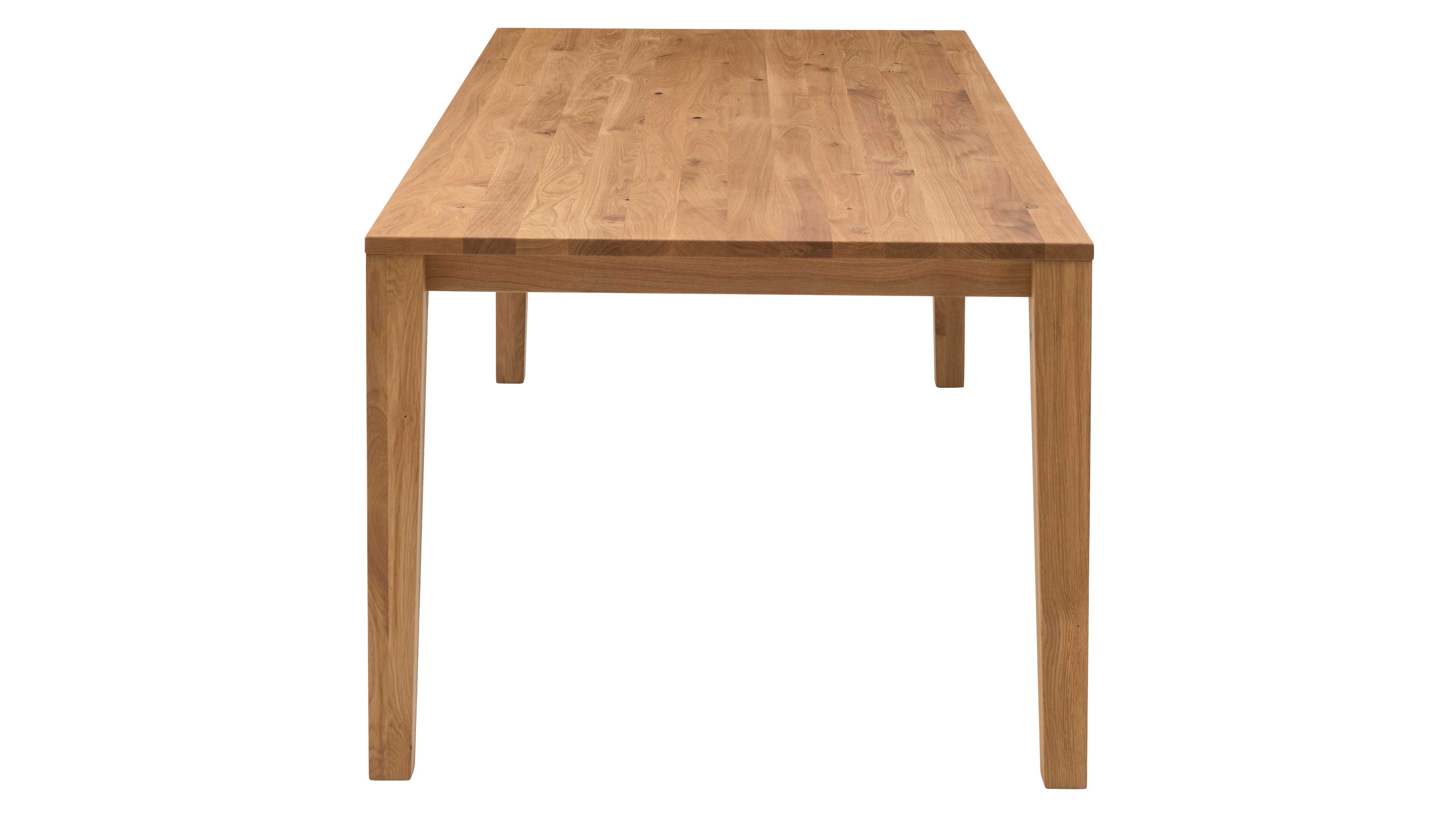Großer rechteckiger Holztisch mit sichtbarer Maserung, durchgehender Tischplatte und vier geraden, leicht konisch zulaufenden Beinen.