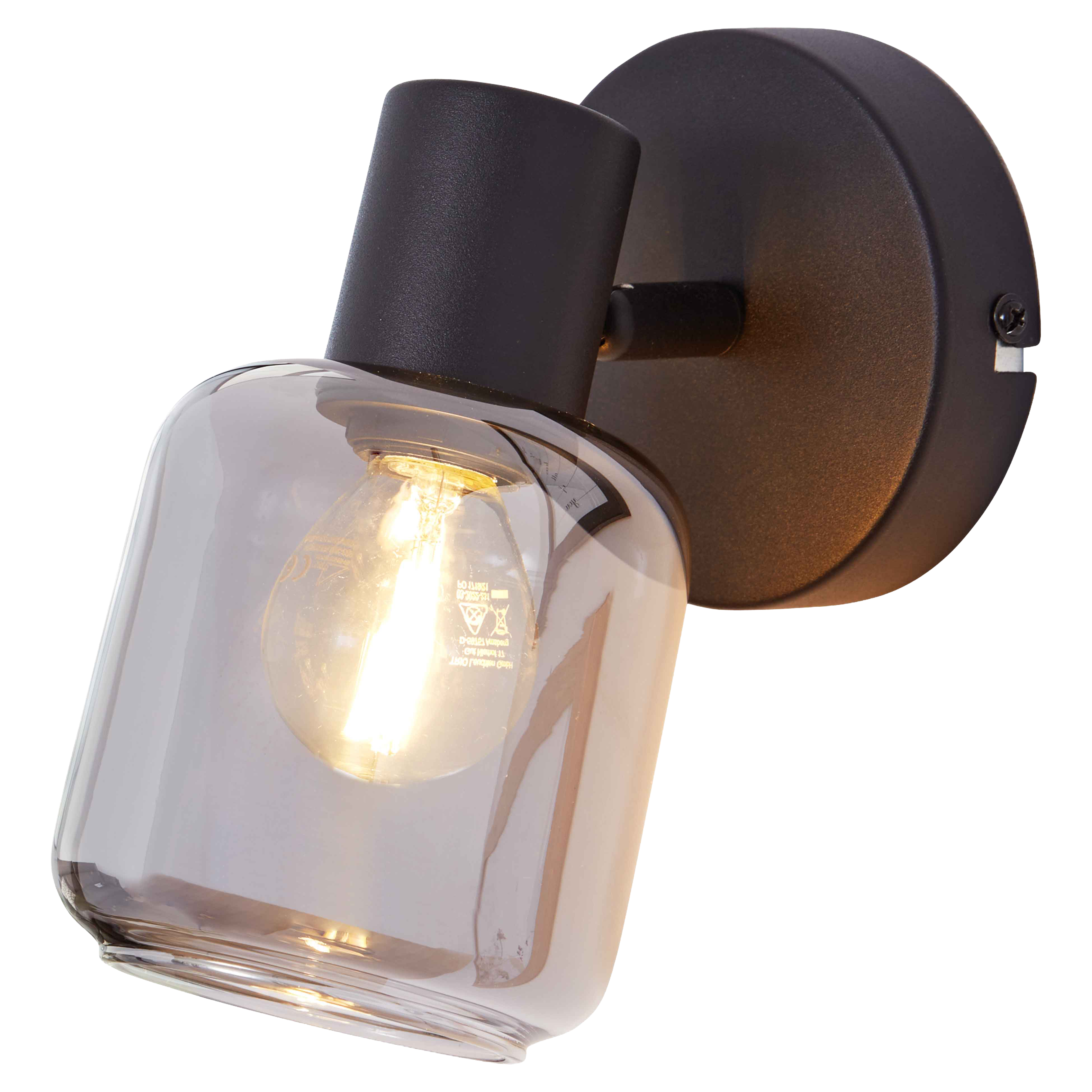 Wandlampe mit rundem schwarzem Metallfuß, kurzem Arm und zylindrischem rauchfarbenem Glasschirm, innen sichtbarem Leuchtmittel.