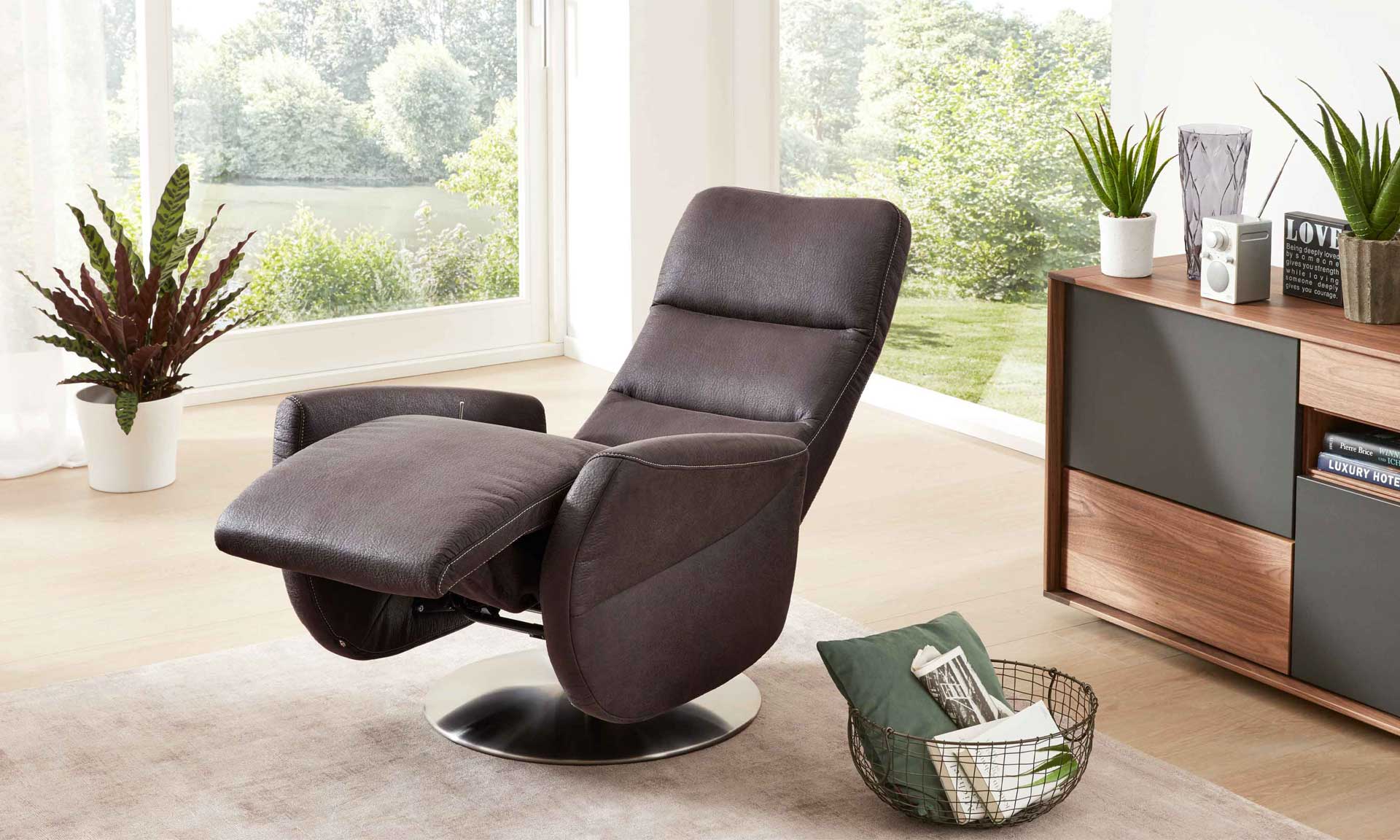 Relaxsessel mit Stoffbezug in anthrazitfarbener Lederoptik und Sternfuß