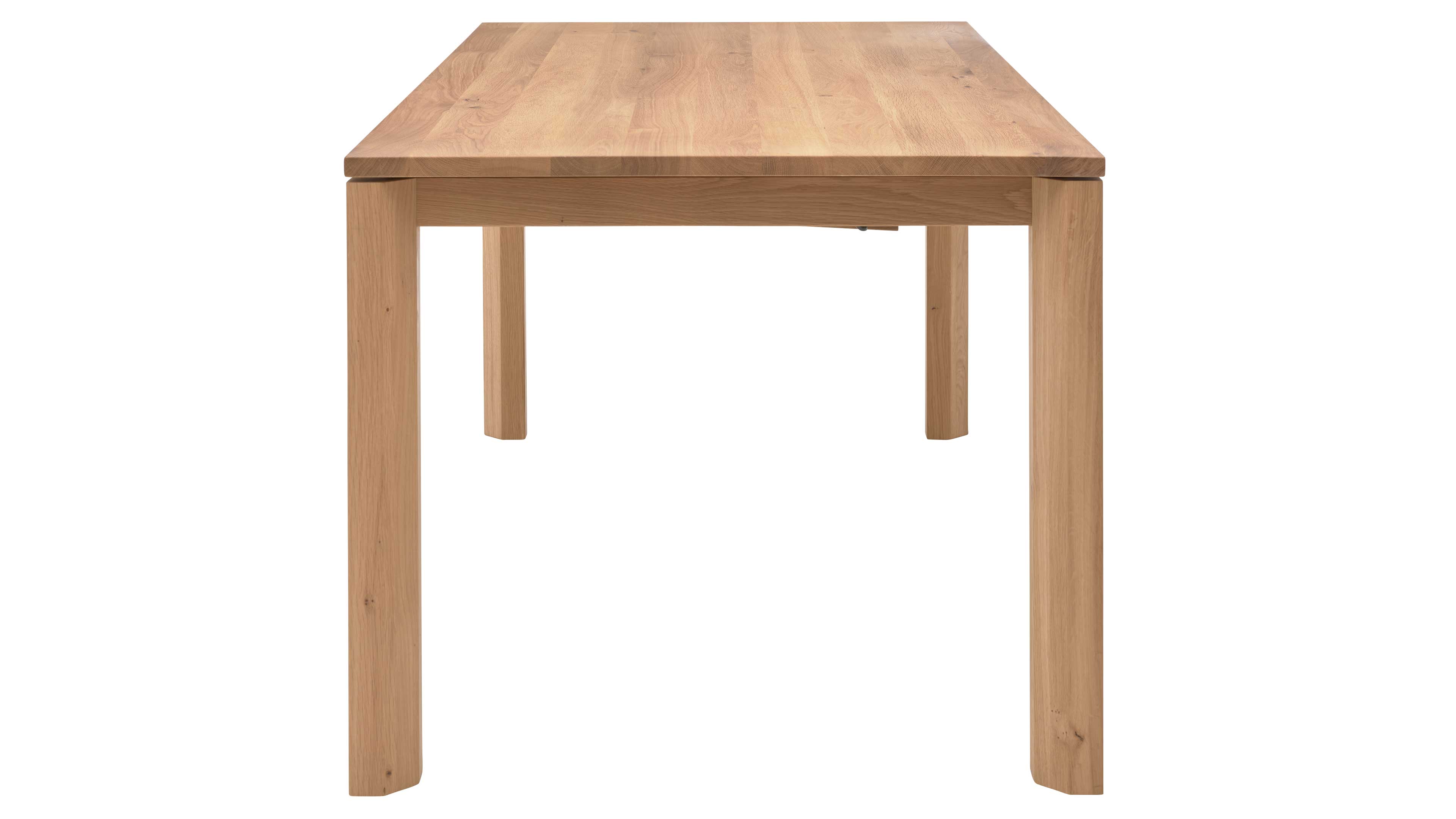 Rechteckiger Esstisch aus hellem Holz mit dickem Tischblatt, sichtbarer Maserung und vier geraden Beinen.