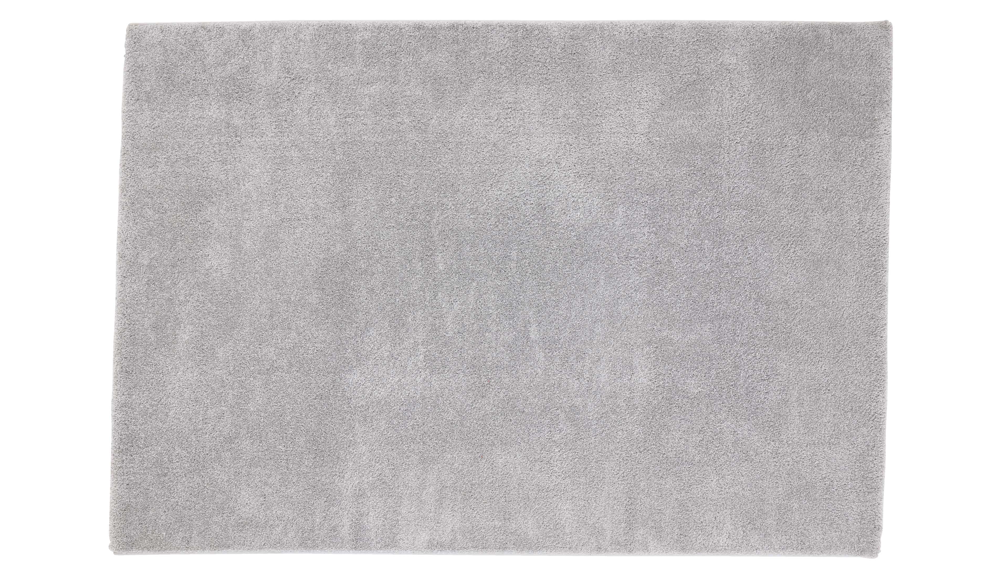 Rechteckiger hellgrauer Teppich mit gleichmäßig kurzem Flor, scharfen Kanten, flach auf weißem Hintergrund.